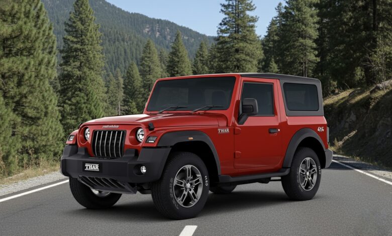 A bright red Mahindra Thar 4x4, seen from the front-left angle, driving on a paved road with green trees and mountains in the background under a clear sky.